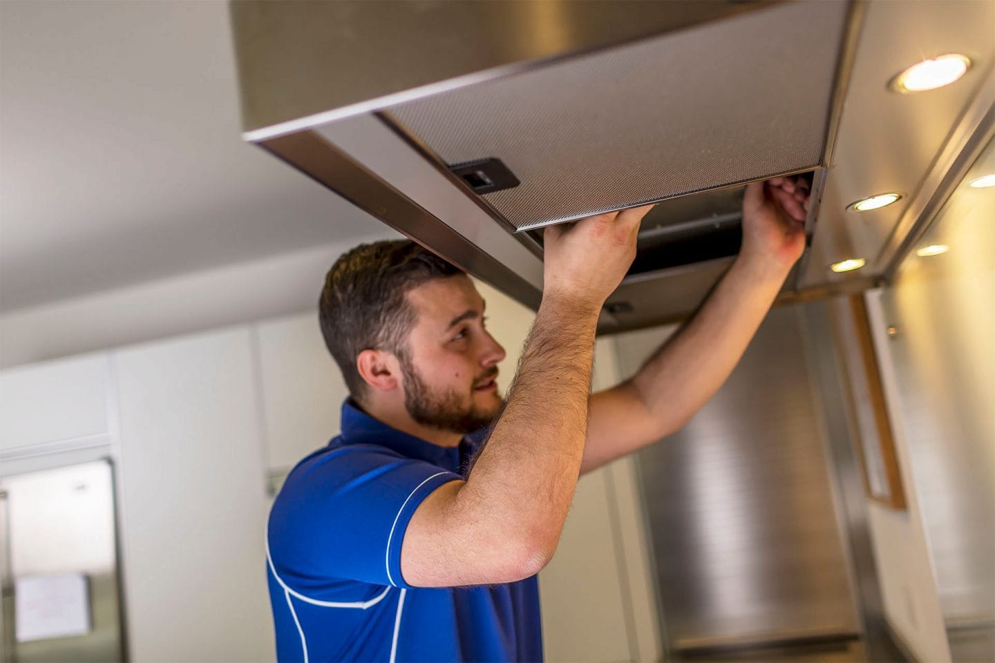 Kitchen hood installer fitting commercial canopy in Coventry